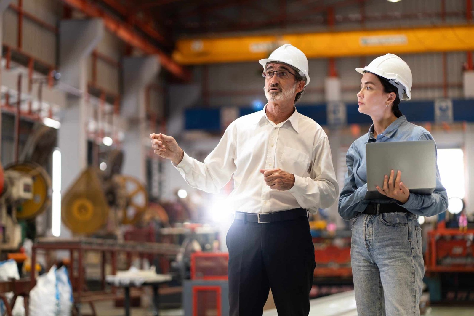 Engineers discussing equipment maintenance